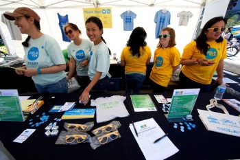 Volunteers selling t-shirts and other items at a recent CicLAvia event.
